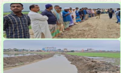 কিশোরগঞ্জে রাস্তা নির্মাণের দাবিতে এলাকাবাসীর মানববন্ধন